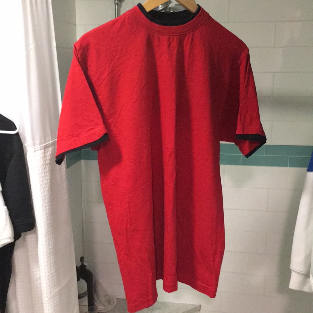 Red tee underlined with black